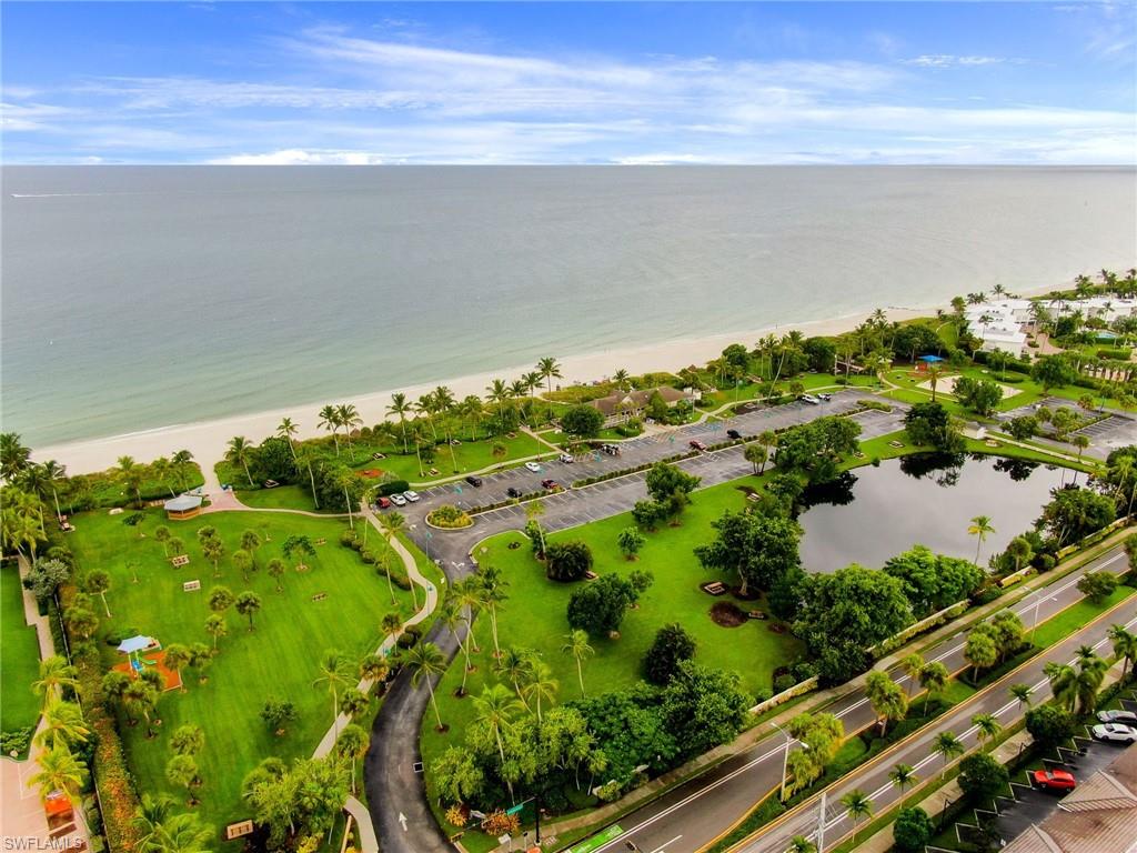 1340 Crayton Road, Unit 4 Naples, FL 34102 - Photo 20 of 20 a view of a lake with a city