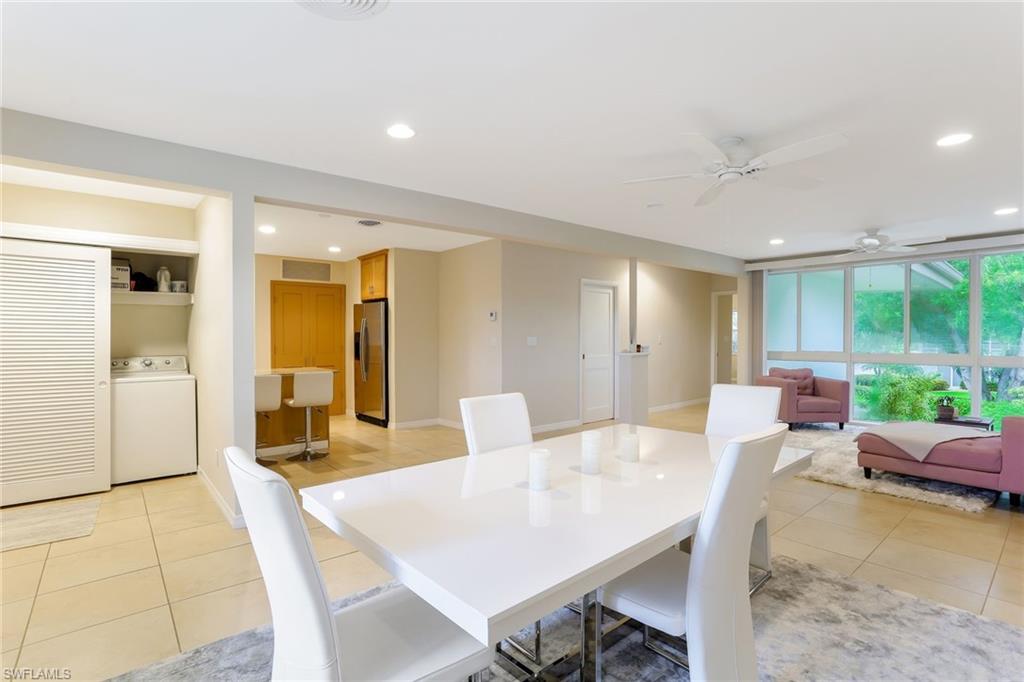 1340 Crayton Road, Unit 4 Naples, FL 34102 - Photo 4 of 20 a view of a dining room with furniture and window