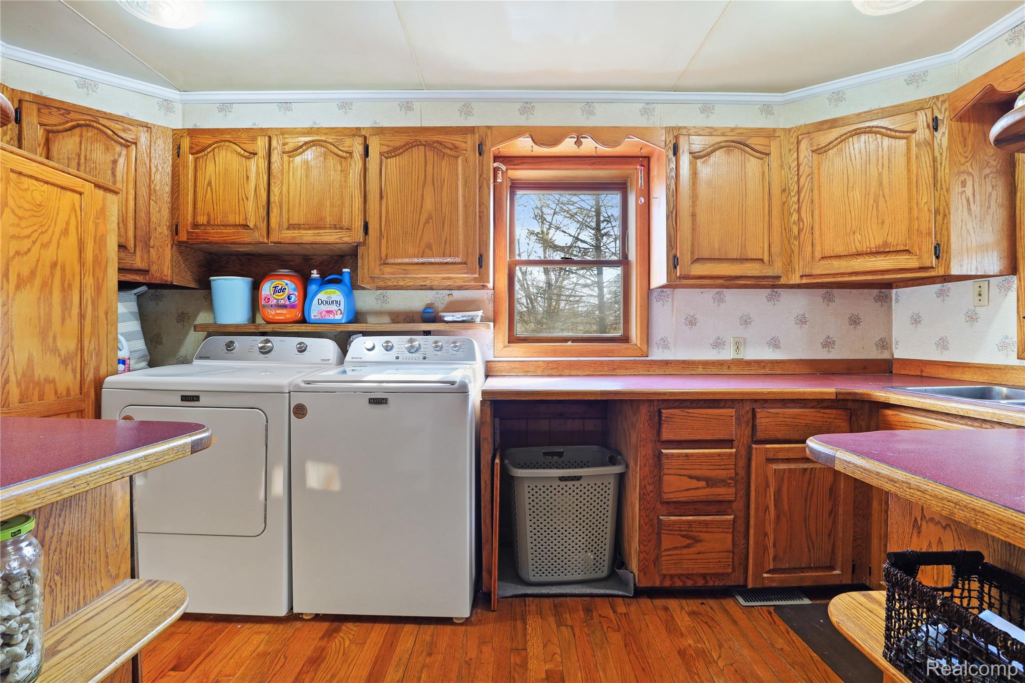 7149-7163 Burpee Road Grand Blanc, MI 48439 - Photo 57 of 72 Laundry area with light wood-type flooring and washer and clothes dryer