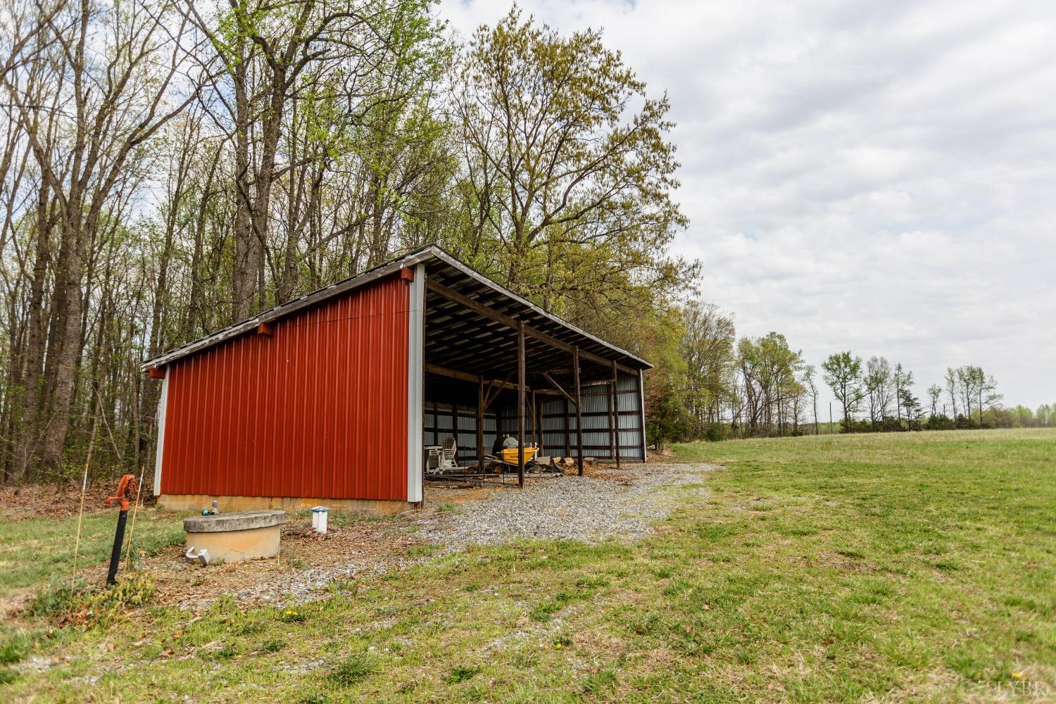 4037 County Line Road Cullen, VA 23934 - Photo 14 of 45 a view of a house with backyard porch and sitting area