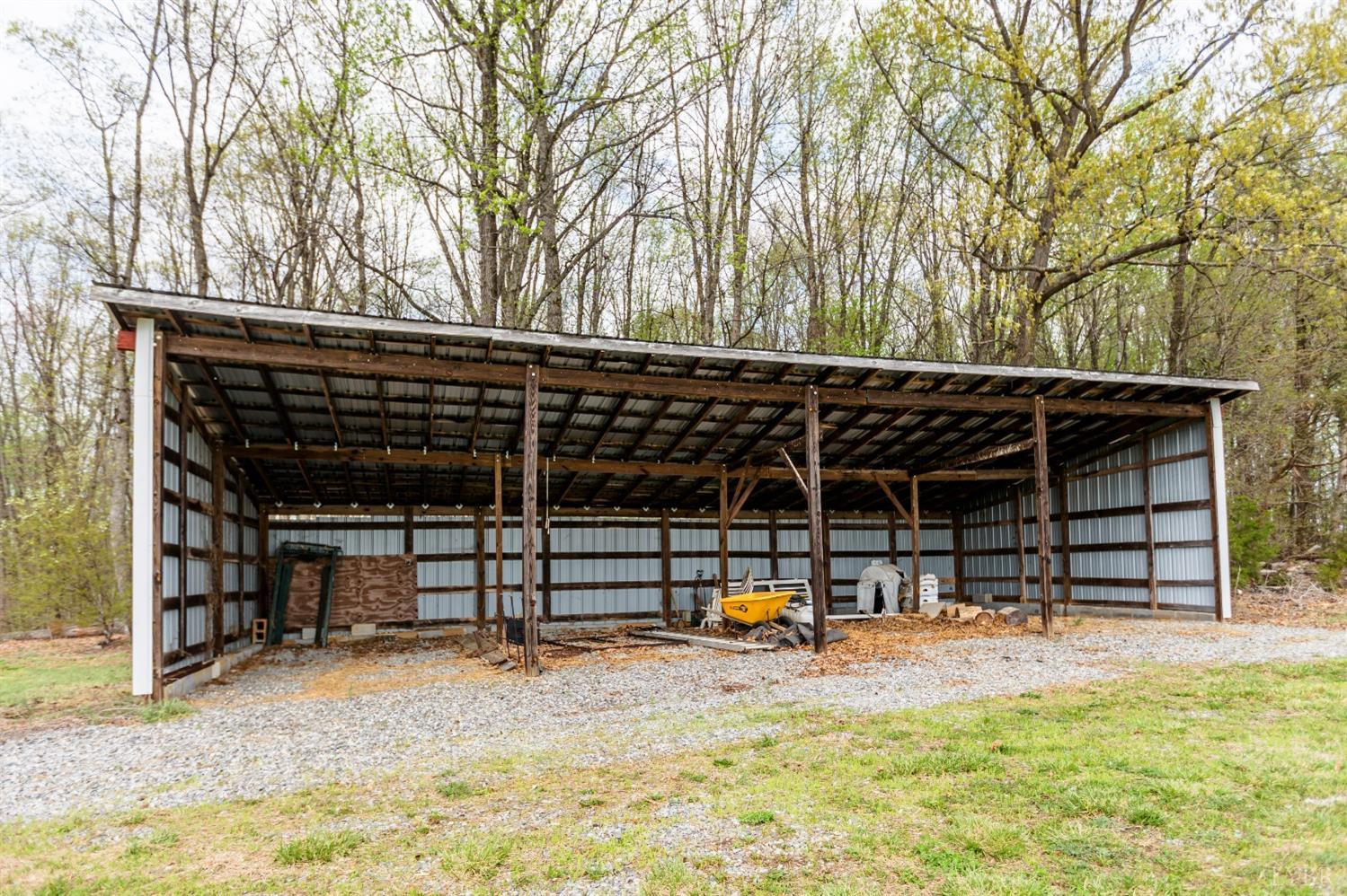 4037 County Line Road Cullen, VA 23934 - Photo 15 of 45 a view of a backyard with wooden fence and a large tree