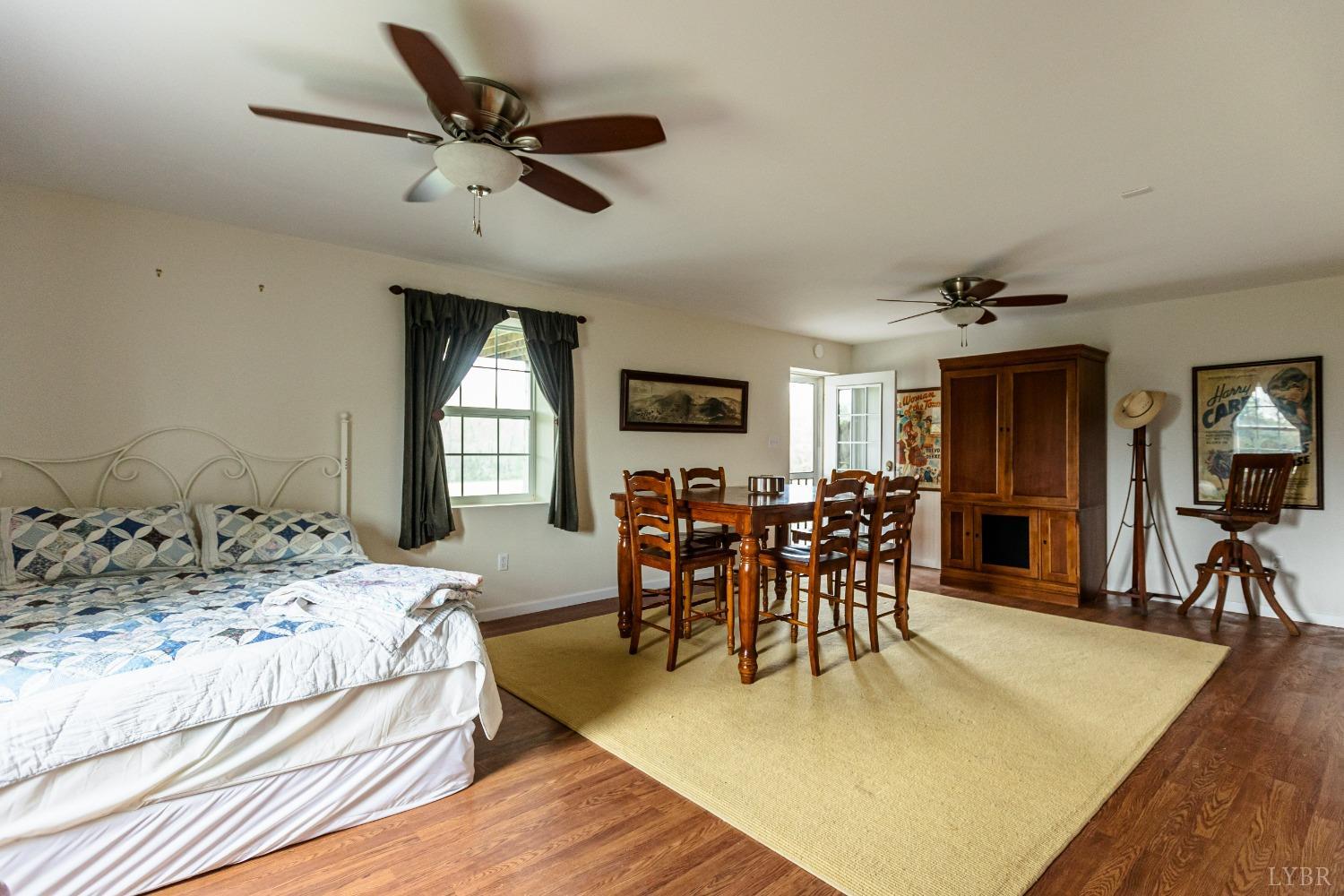 4037 County Line Road Cullen, VA 23934 - Photo 21 of 45 a living room with furniture and a large window