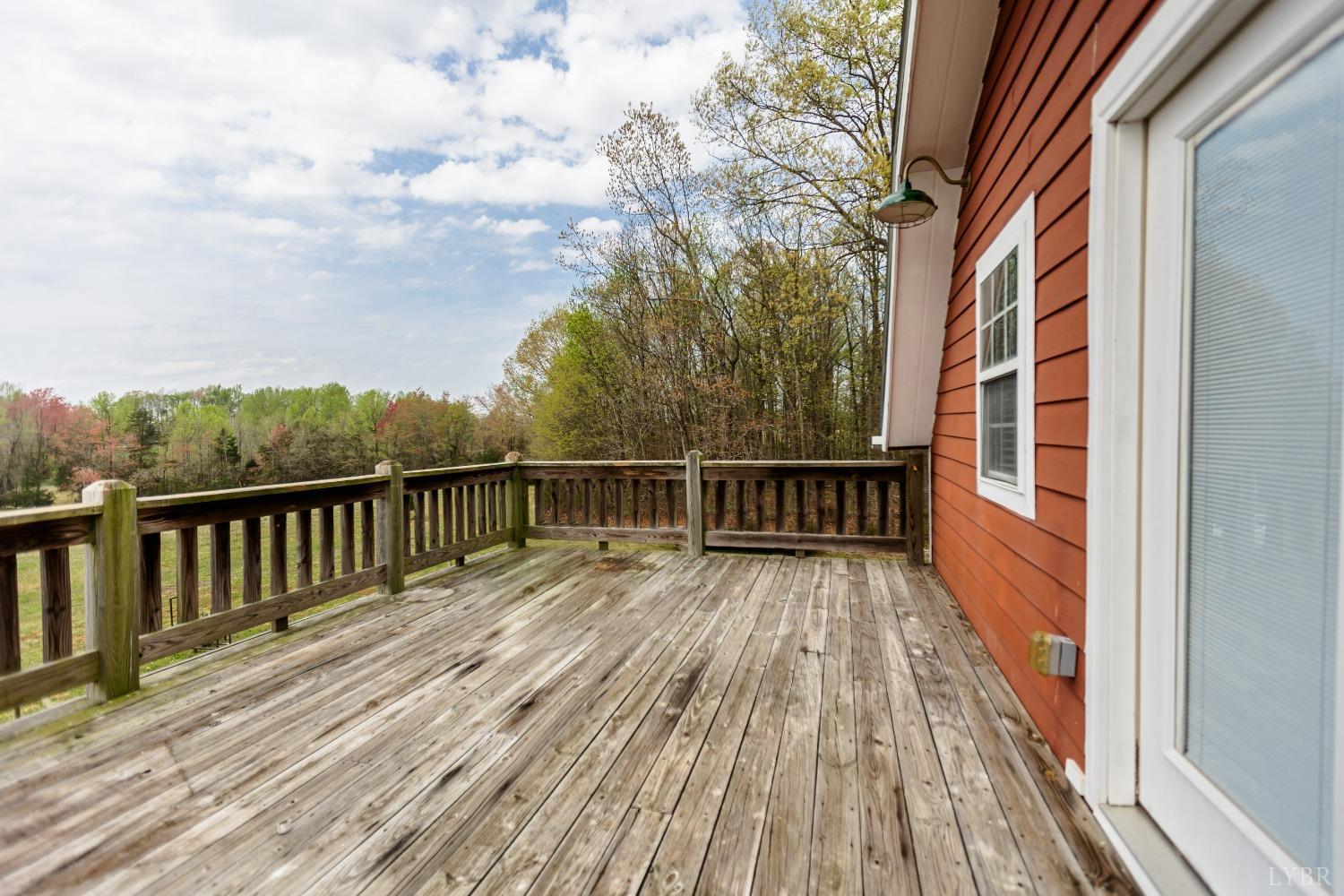 4037 County Line Road Cullen, VA 23934 - Photo 29 of 45 a view of balcony with wooden floor and fence