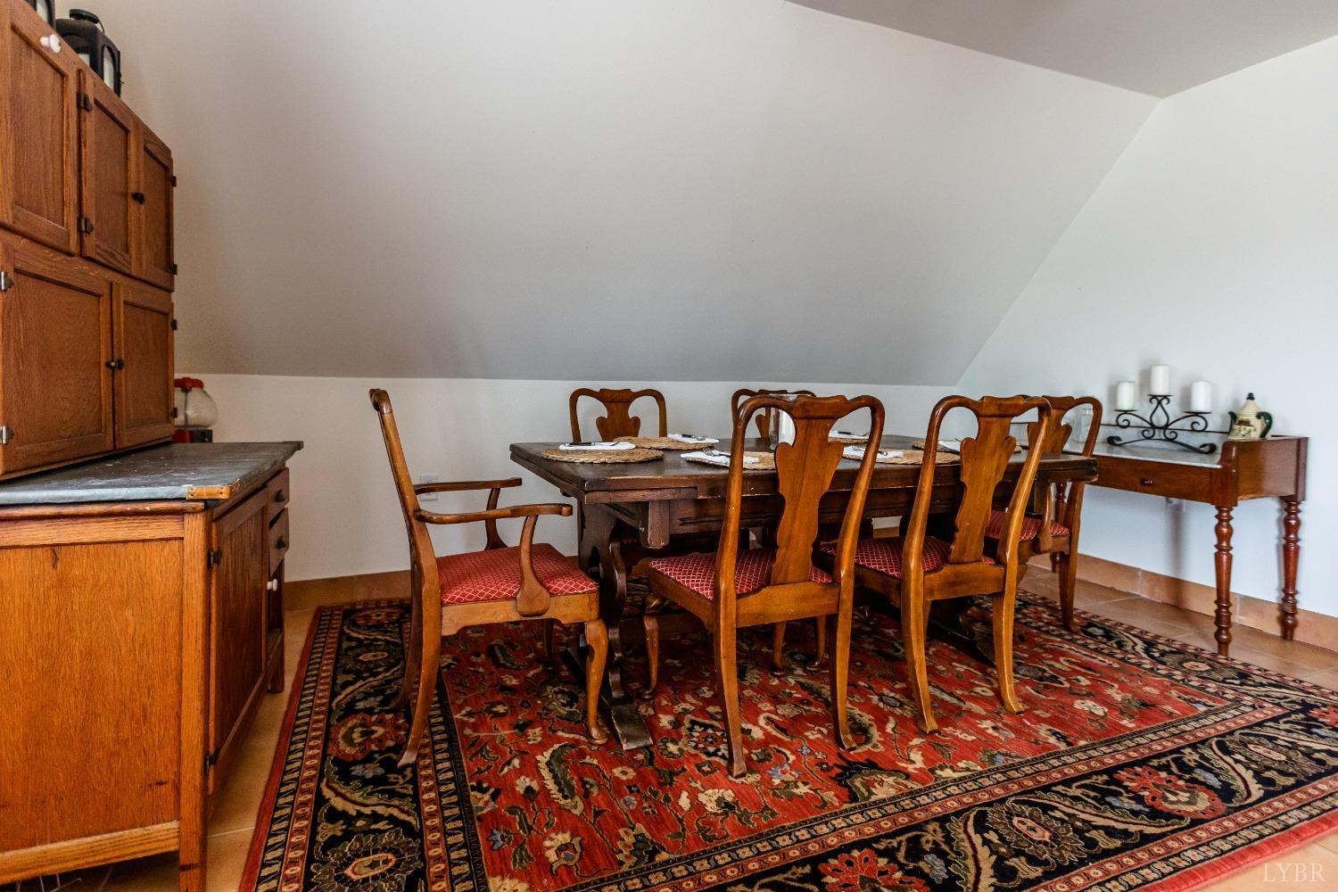 4037 County Line Road Cullen, VA 23934 - Photo 36 of 45 a view of a dining room with furniture and wooden floor