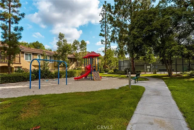 a view of a park with swings