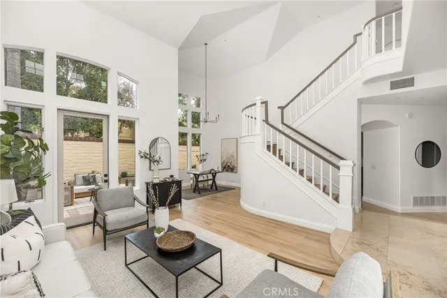 a living room with furniture and a table