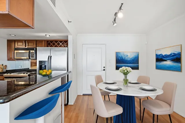 a view of a dining room with furniture