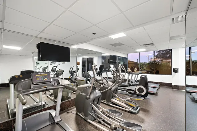 a view of a room with gym equipment