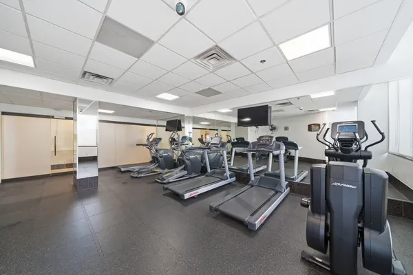 a view of a room with gym equipment