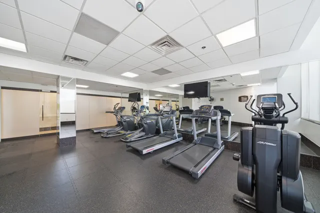 a view of a room with gym equipment