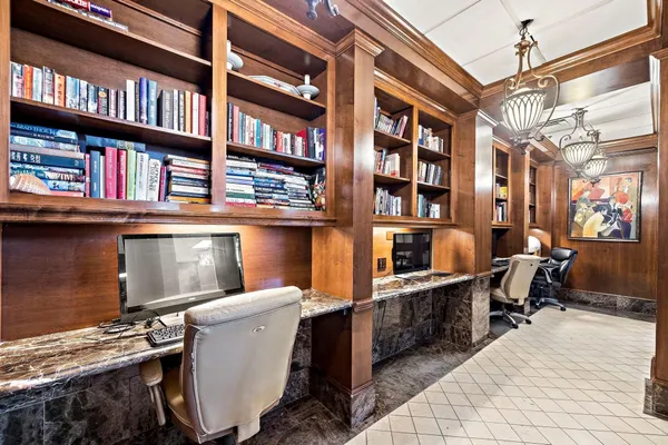 a view of a workspace with furniture