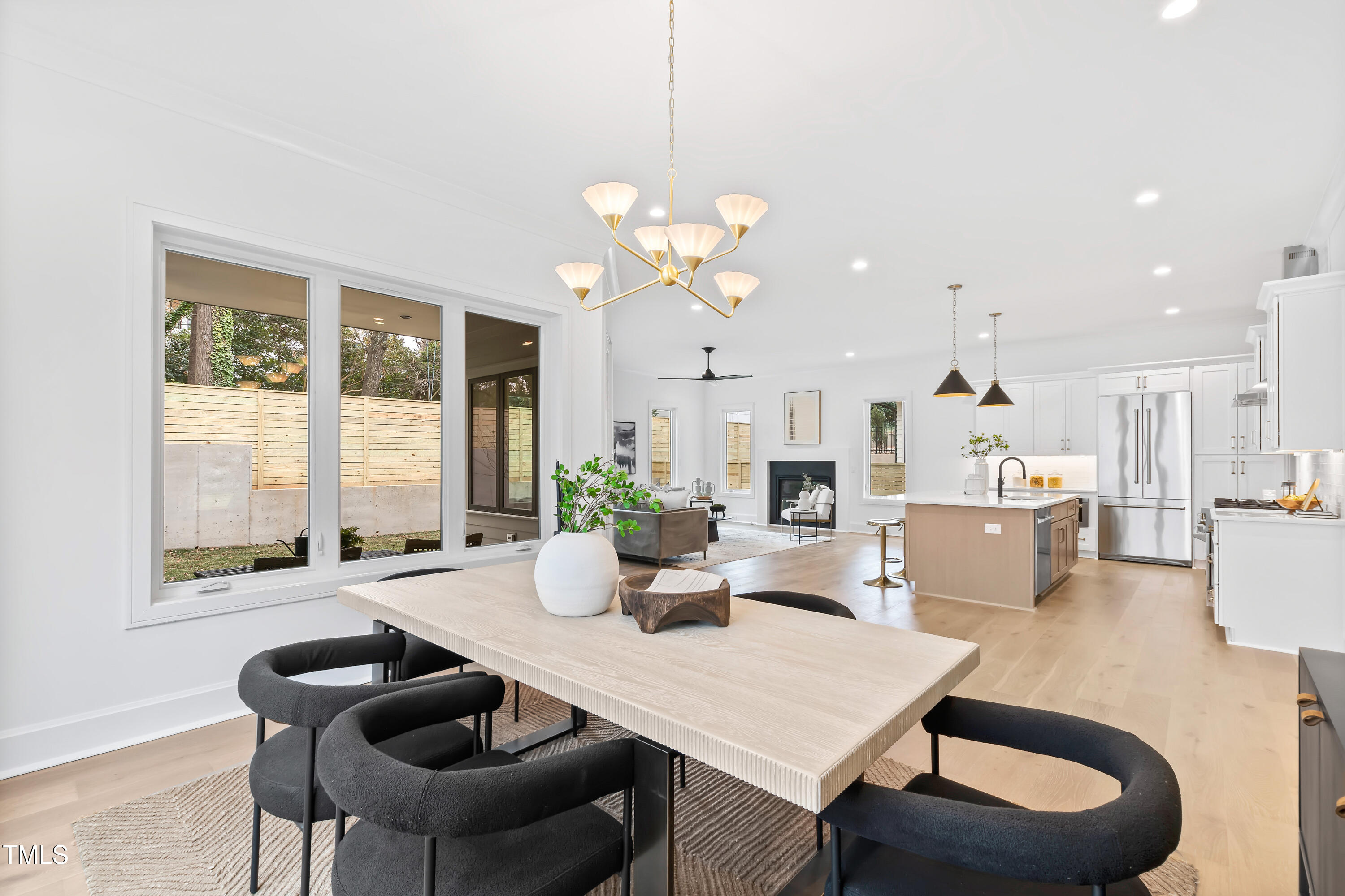 2417 Mayview Road Raleigh, NC 27607 - Photo 20 of 61 a view of a dining room with furniture and a large window