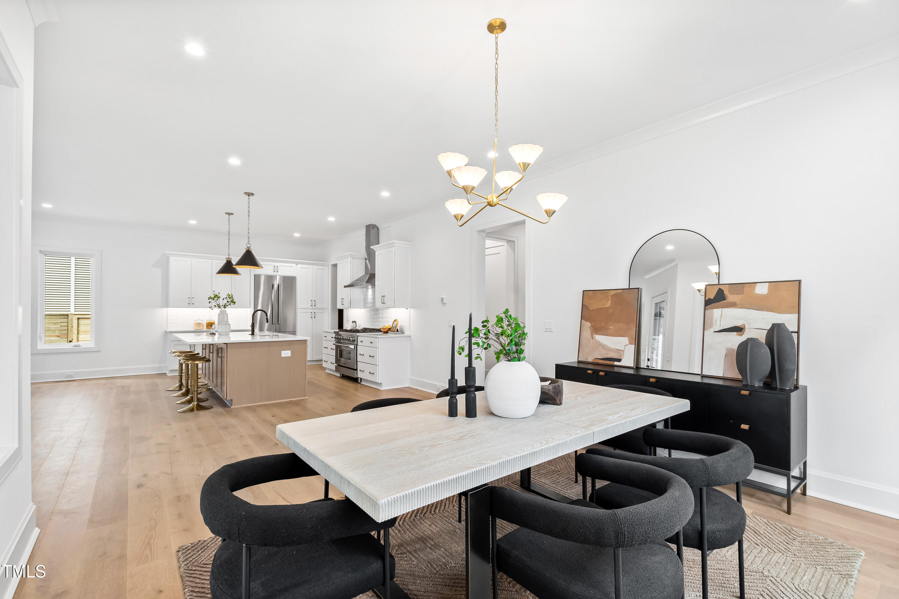 2417 Mayview Road Raleigh, NC 27607 - Photo 21 of 61 a dining room with furniture and wooden floor