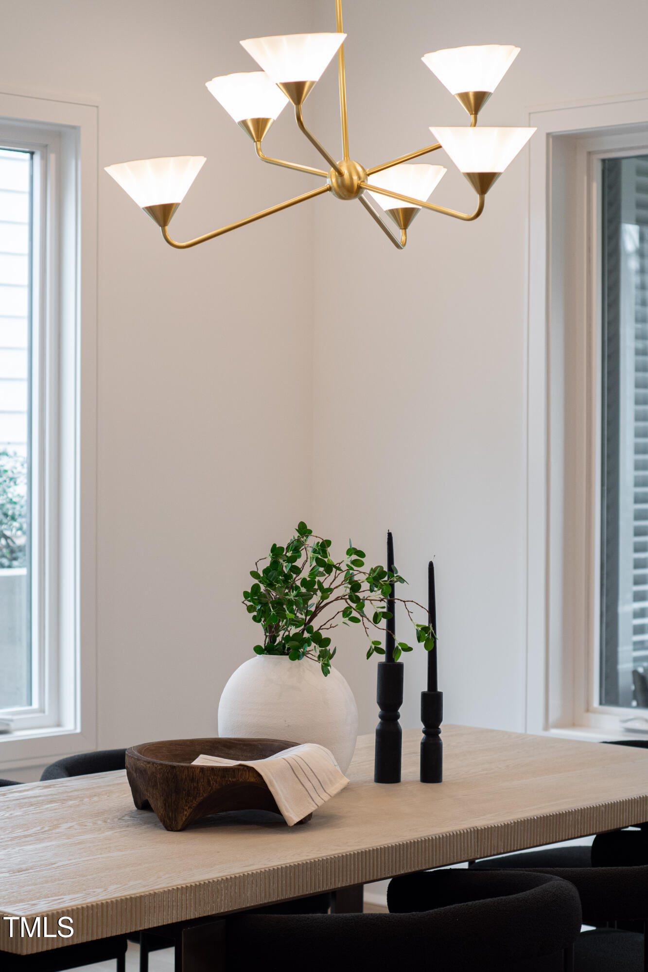 2417 Mayview Road Raleigh, NC 27607 - Photo 22 of 61 a room with a potted plant on the counter and a sink