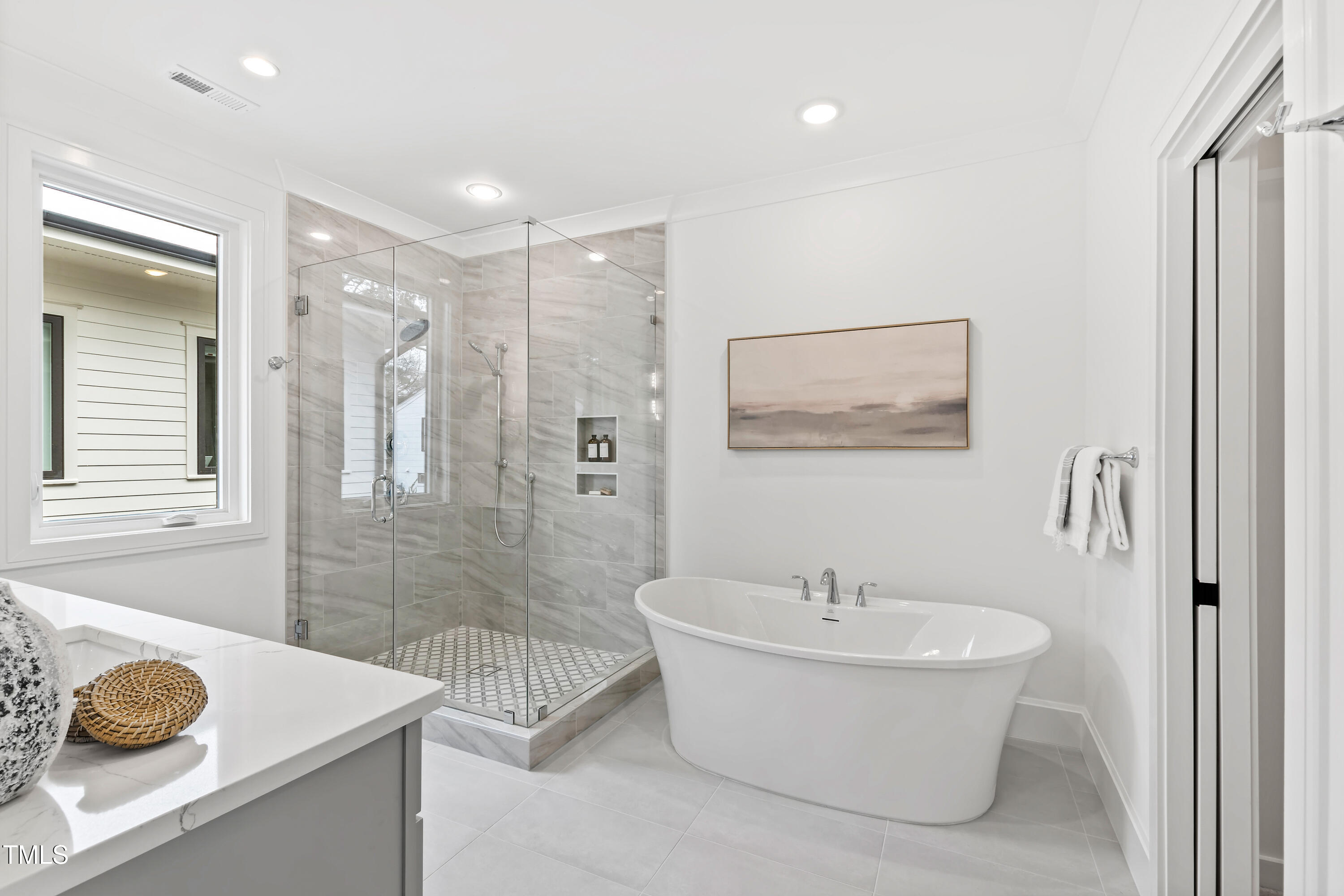 2417 Mayview Road Raleigh, NC 27607 - Photo 35 of 61 a bathroom with a sink and a mirror