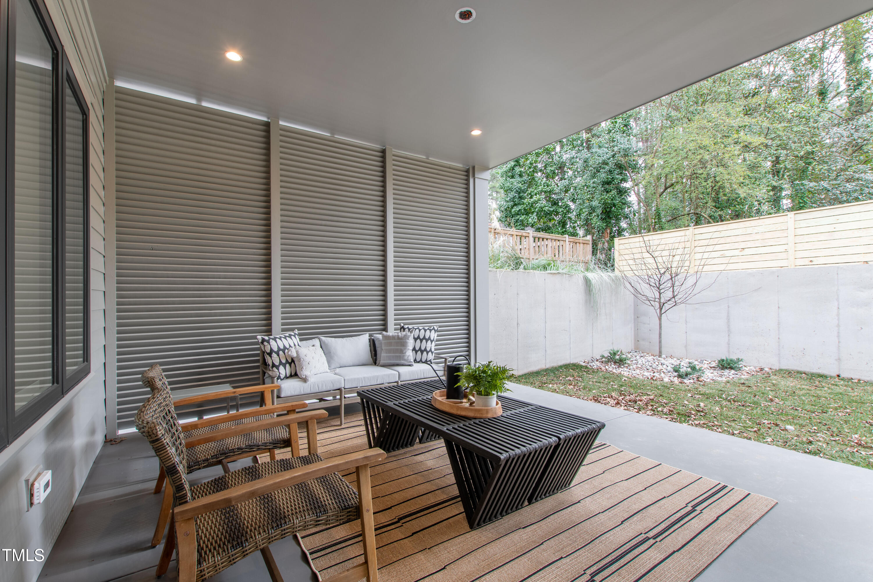 2417 Mayview Road Raleigh, NC 27607 - Photo 52 of 61 a backyard of a house with outdoor seating