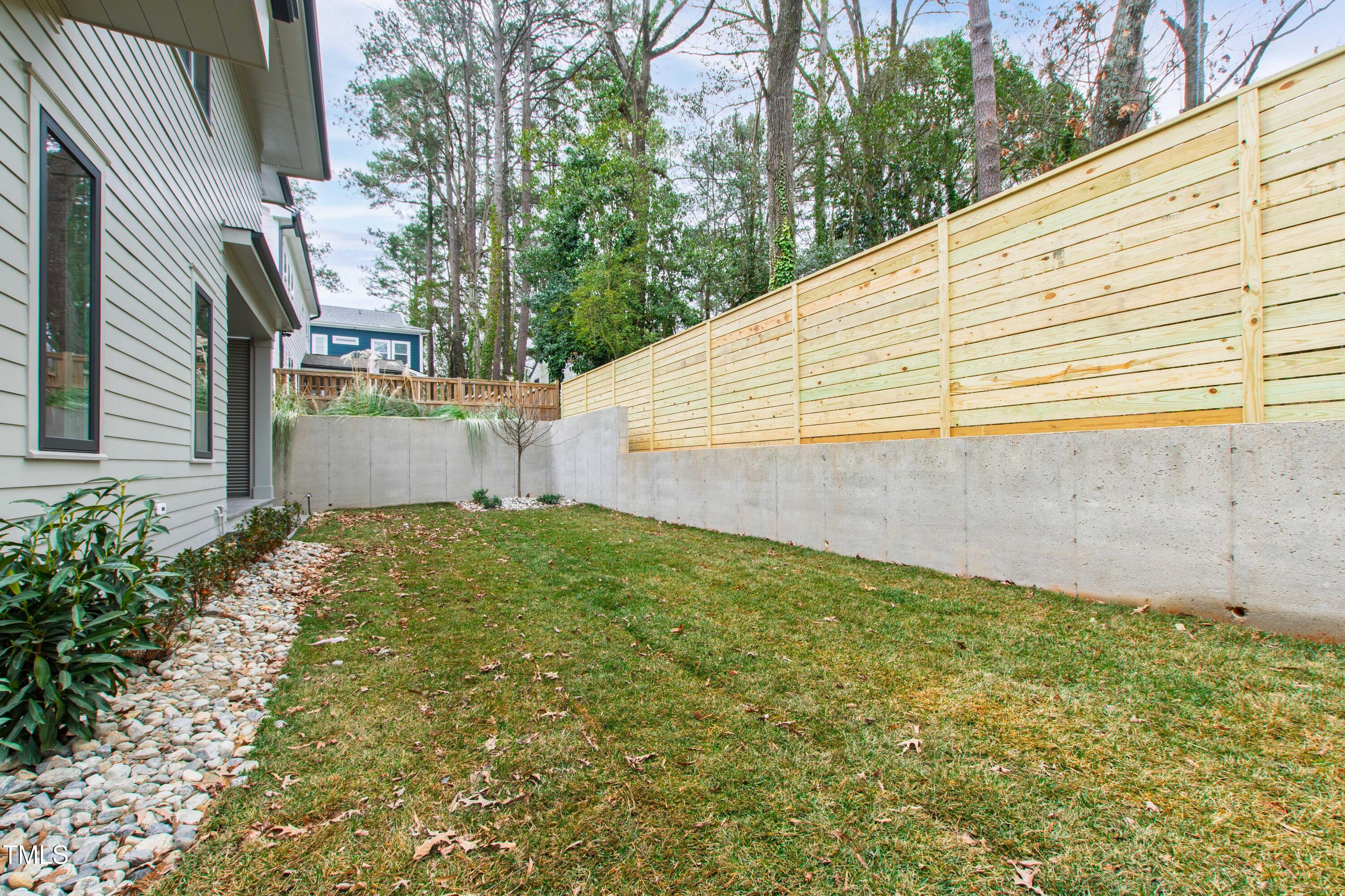 2417 Mayview Road Raleigh, NC 27607 - Photo 57 of 61 a backyard of a house