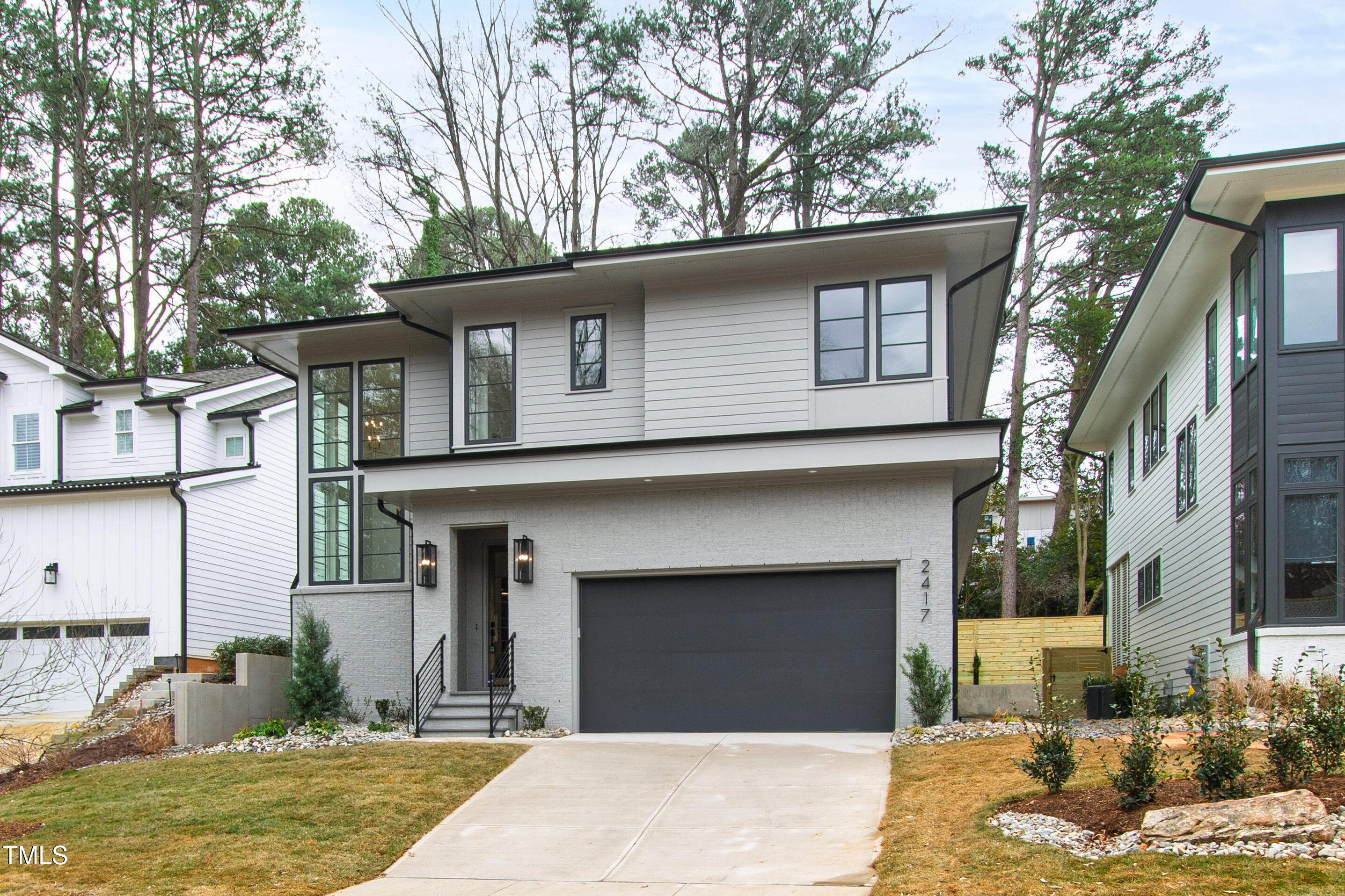 2417 Mayview Road Raleigh, NC 27607 - Photo 58 of 61 a front view of a house with garden