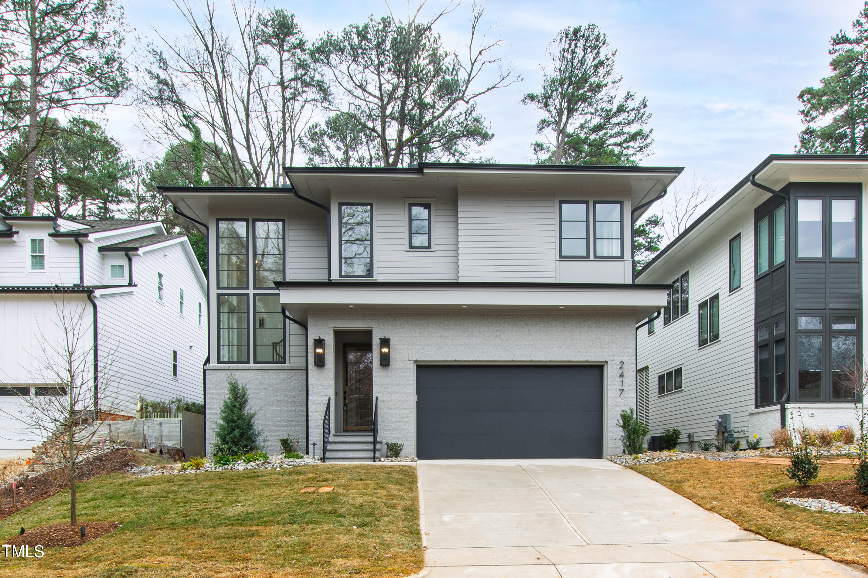 2417 Mayview Road Raleigh, NC 27607 - Photo 60 of 61 a front view of a house with garden