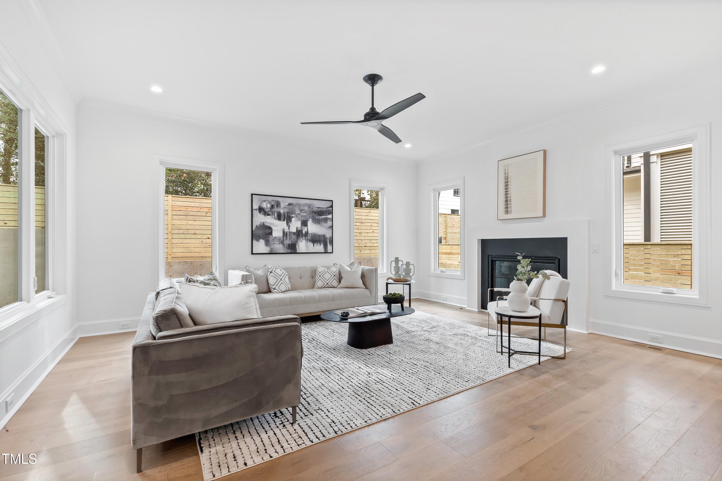 2417 Mayview Road Raleigh, NC 27607 - Photo 7 of 61 a living room with fireplace furniture and a window