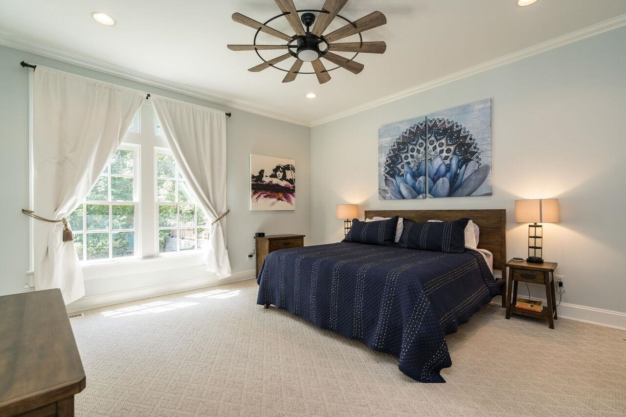 1621 Lorraine Road Raleigh, NC 27607 - Photo 16 of 28 HUGE master bedroom with a view of the beautiful backyard!