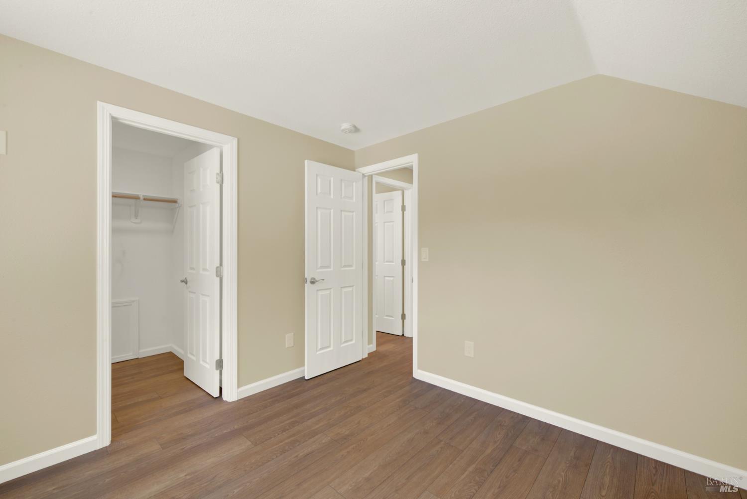 4851 Udell Road Vacaville, CA 95688 - Photo 27 of 65 a view of an empty room with wooden floor