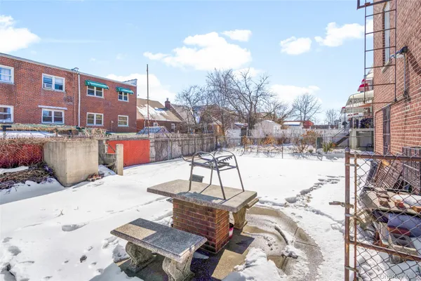 a view of a terrace with furniture