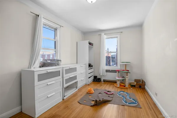 a room with furniture and a dresser