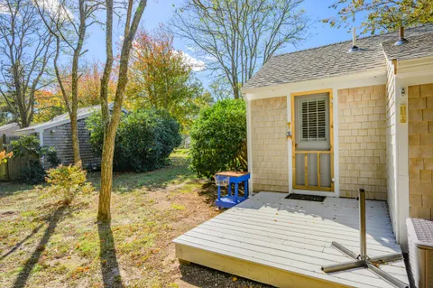 a backyard of a house with seating space
