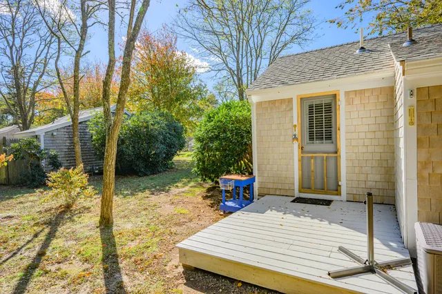 a backyard of a house with seating space