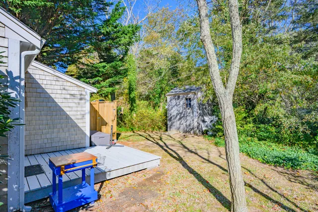 a backyard of a house with seating space