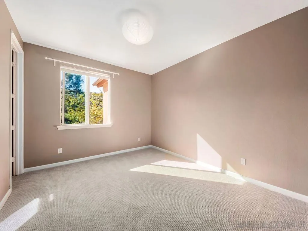17568 Ralphs Ranch Road San Diego, CA 92127 - Photo 14 of 25 an empty room with windows