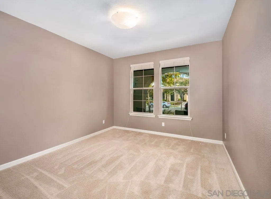 17568 Ralphs Ranch Road San Diego, CA 92127 - Photo 19 of 25 a view of an empty room with a window