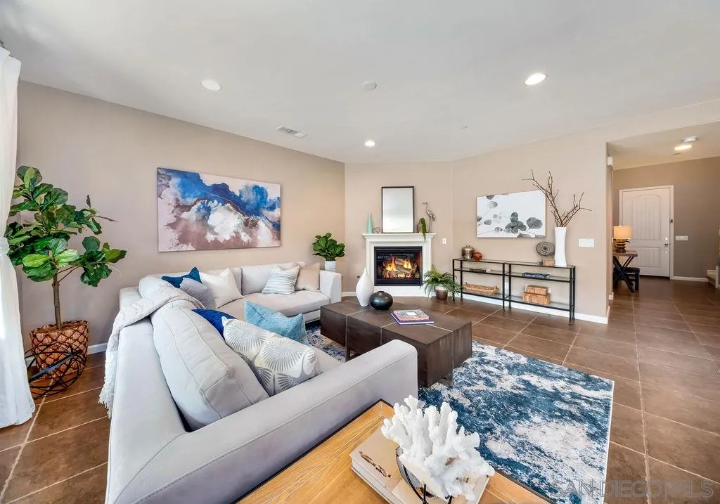 17568 Ralphs Ranch Road San Diego, CA 92127 - Photo 2 of 25 a living room with furniture and a couch