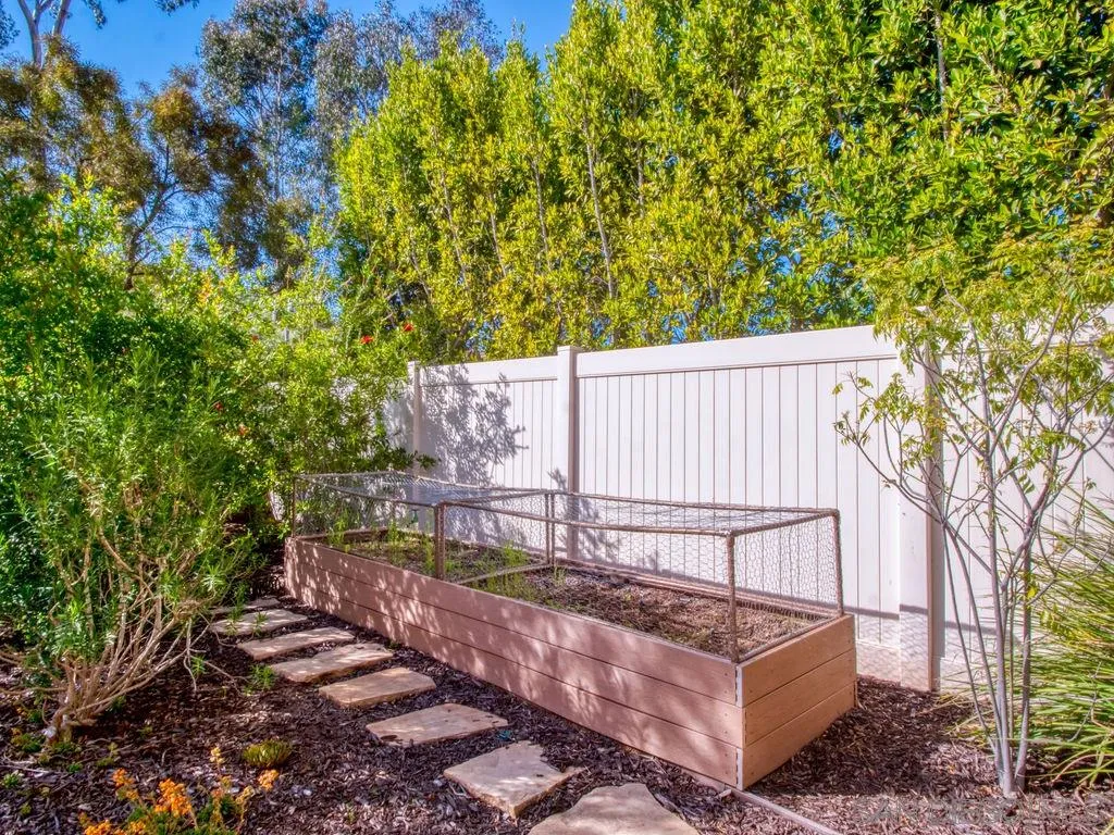 17568 Ralphs Ranch Road San Diego, CA 92127 - Photo 24 of 25 a view of a wooden fence with a tree