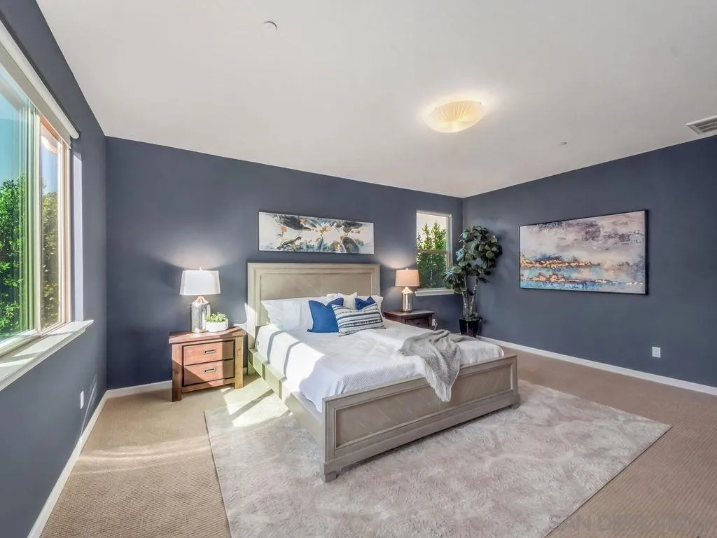17568 Ralphs Ranch Road San Diego, CA 92127 - Photo 10 of 25 a bedroom with a bed and a large window