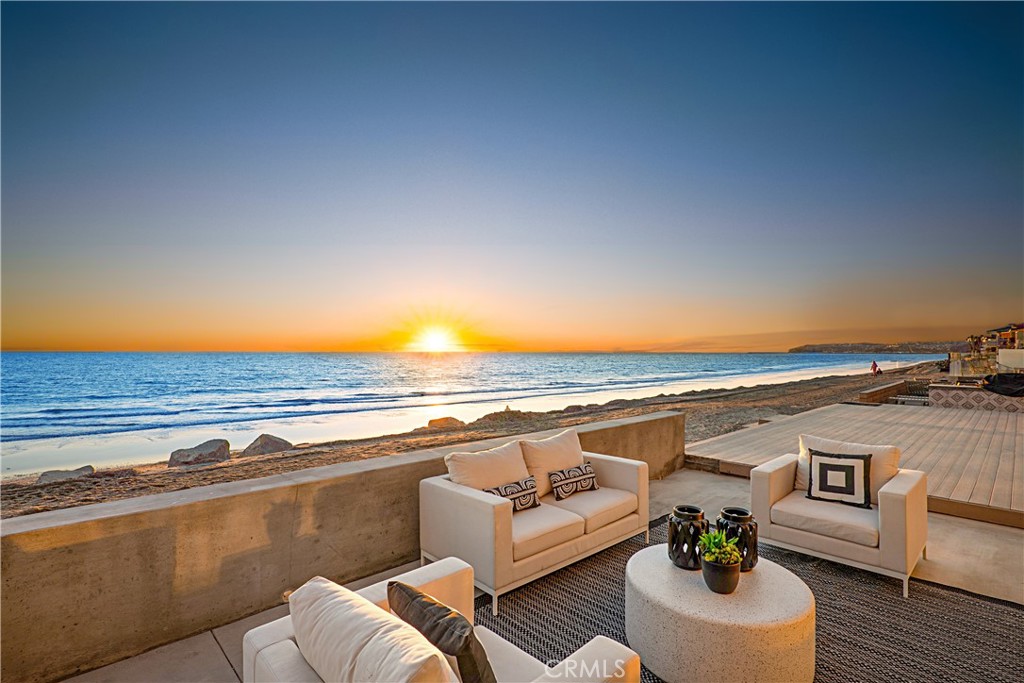 a view of sitting area with furniture and wooden floor