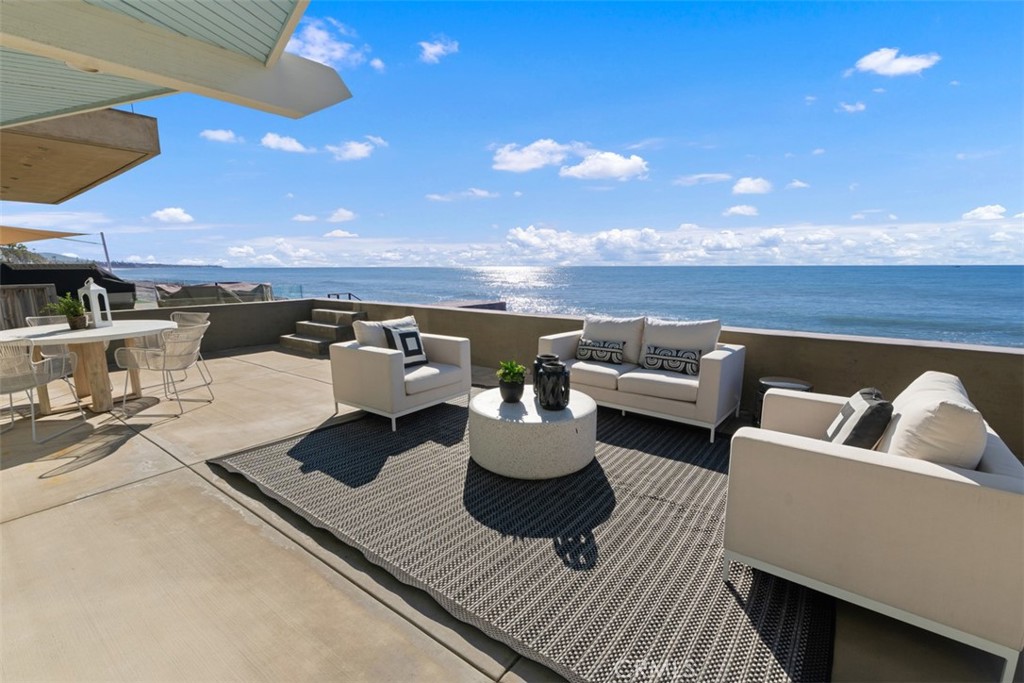 35261 Beach Road Dana Point, CA 92624 - Photo 14 of 45 a view of a patio with couches and potted plants