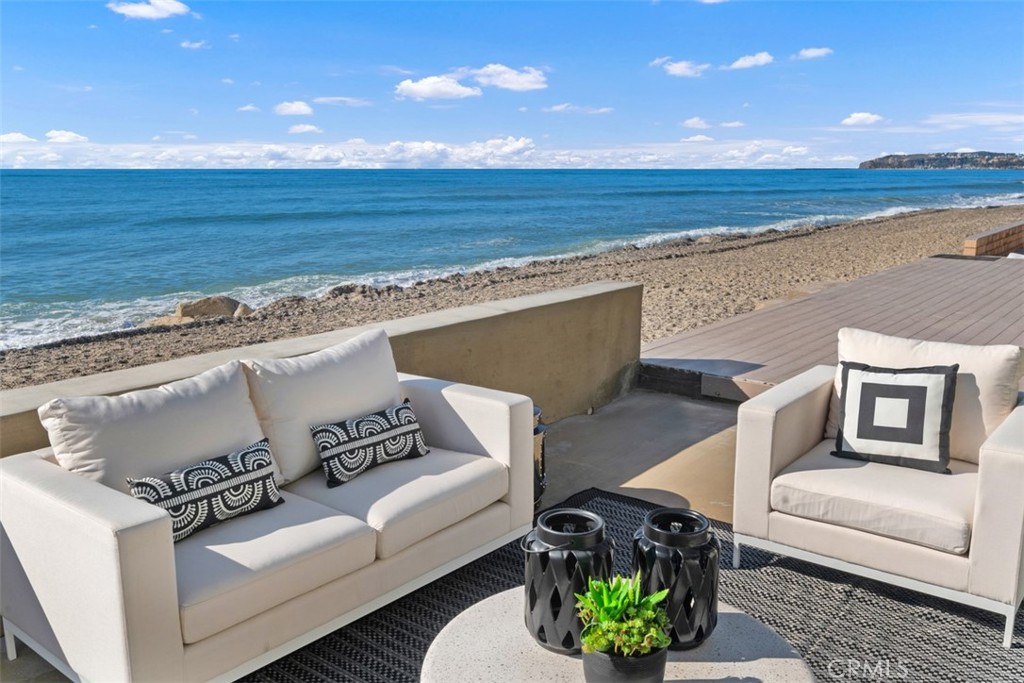 35261 Beach Road Dana Point, CA 92624 - Photo 15 of 45 a view of roof deck with couches and ocean view