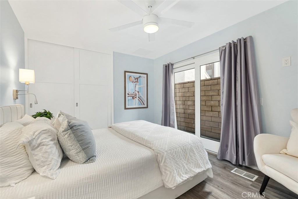 35261 Beach Road Dana Point, CA 92624 - Photo 17 of 45 a bedroom with a bed and a chair