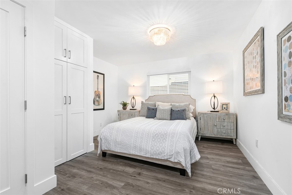 35261 Beach Road Dana Point, CA 92624 - Photo 18 of 45 a bedroom with a bed and a window