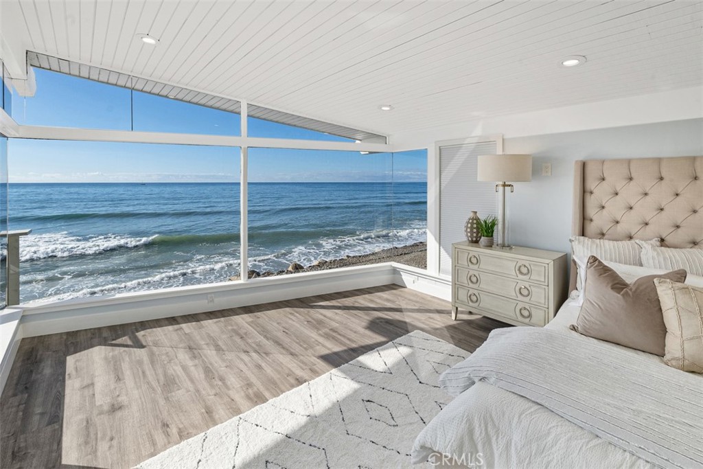 35261 Beach Road Dana Point, CA 92624 - Photo 24 of 45 a bedroom with a bed and a stove