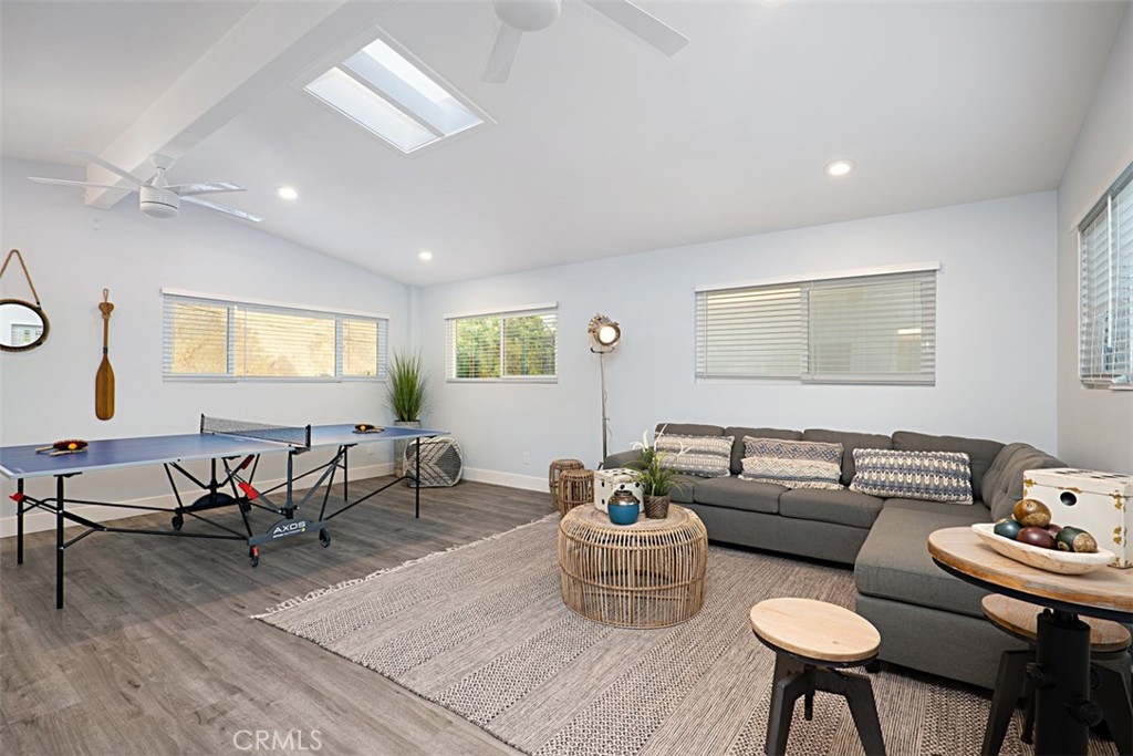 35261 Beach Road Dana Point, CA 92624 - Photo 33 of 45 a living room with furniture and a wooden floor