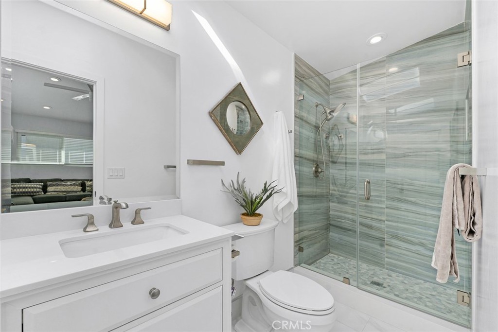 35261 Beach Road Dana Point, CA 92624 - Photo 36 of 45 a bathroom with a sink a toilet and shower