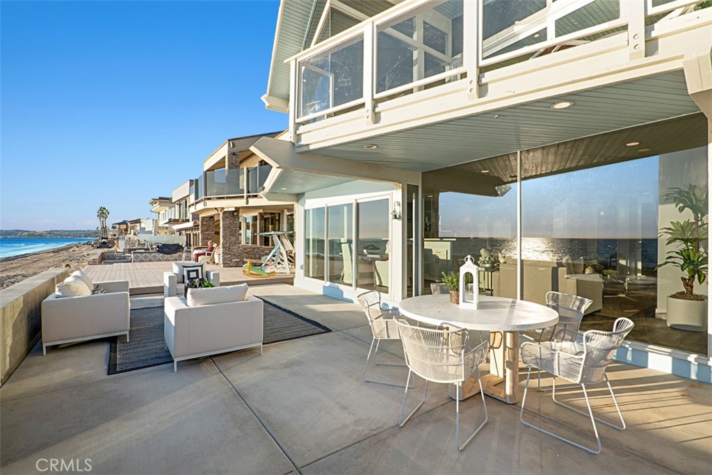 35261 Beach Road Dana Point, CA 92624 - Photo 43 of 45 a view of a patio with couches table and chairs