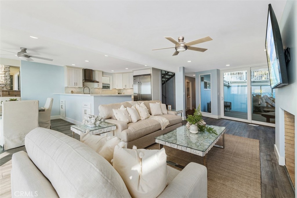 35261 Beach Road Dana Point, CA 92624 - Photo 7 of 45 a living room with furniture and a flat screen tv