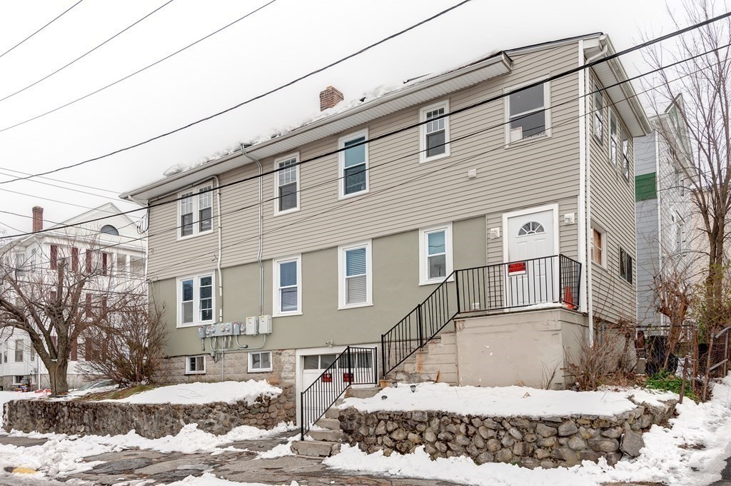 26 King Philip Road Worcester, MA 01606 - Photo 2 of 16 a view of a house with a snow