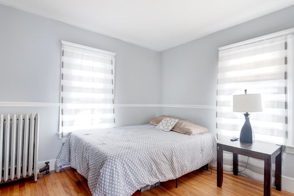 26 King Philip Road Worcester, MA 01606 - Photo 8 of 16 a bedroom with a bed and a window