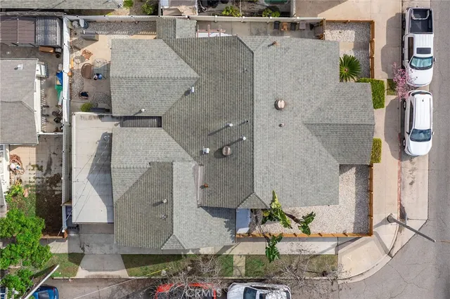 an aerial view of a house with outdoor space