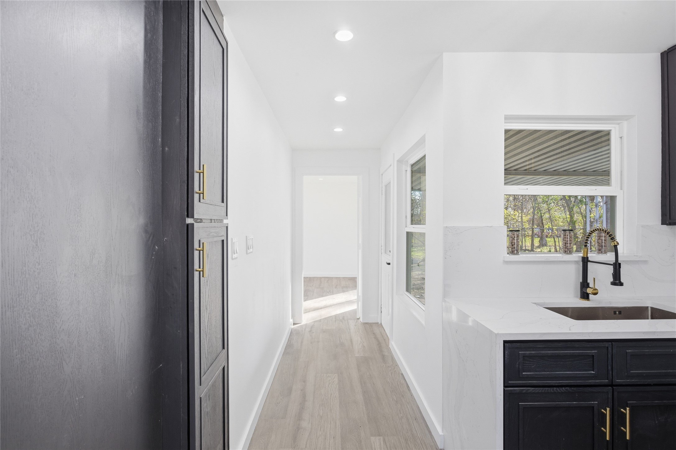 4516 Werner Street Houston, TX 77022 - Photo 12 of 28 Walkway to the master bedroom